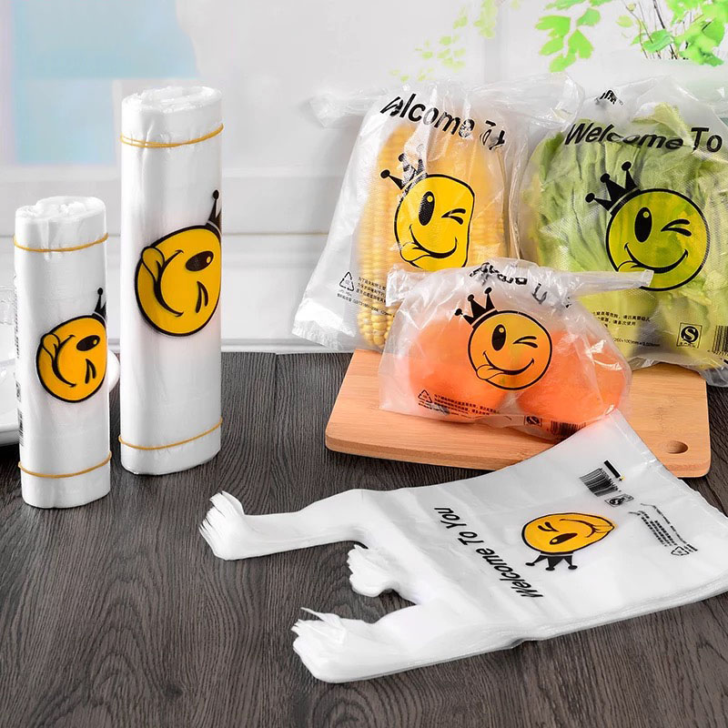 50pcs/lot clear plastic carry bag smiley face plastic bags Welcome to you supermarket shopping packing bags with handles large